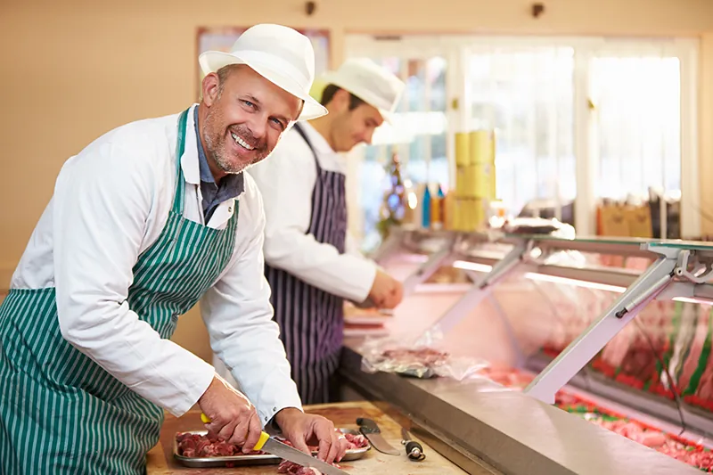 Avoiding workplace injuries.  Butcher at work.