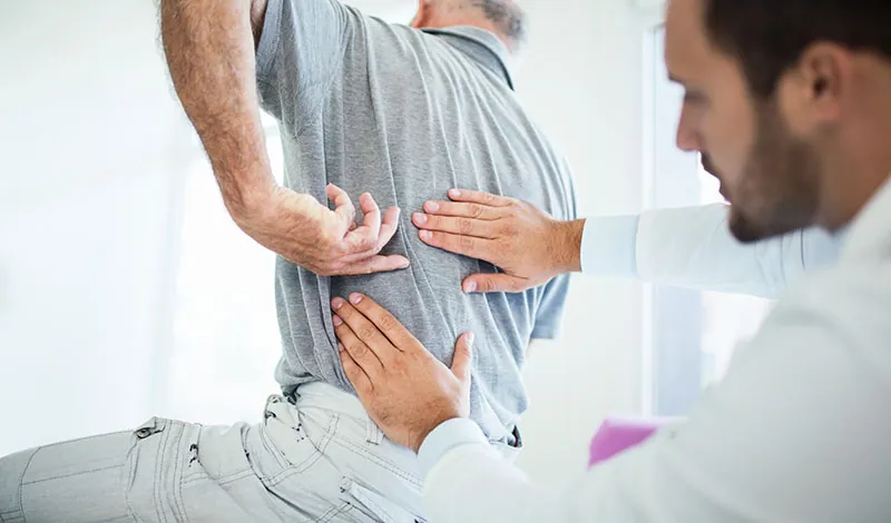 Doctor reviewing injuries
