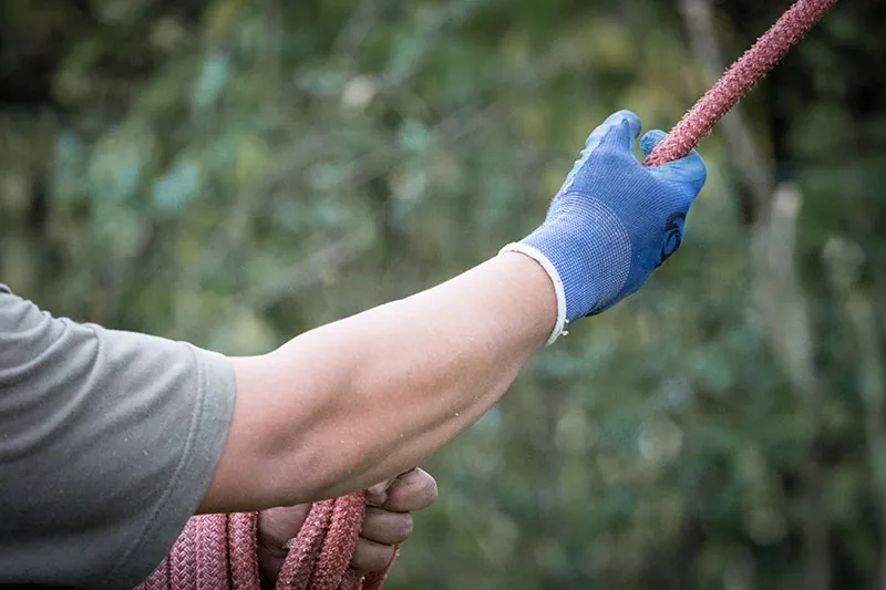 Man aggravating his elbow while working.