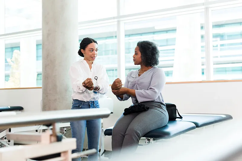 Temporary disability benefits: teacher getting advice from doctor